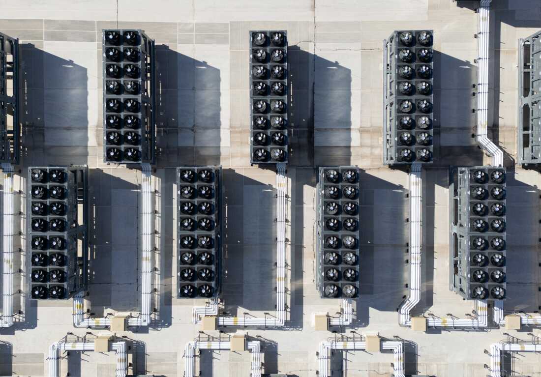 This aerial photo shows rows of cooling vent fans on the roof of a Digital Realty data center in Ashburn, Virginia, in 2025.