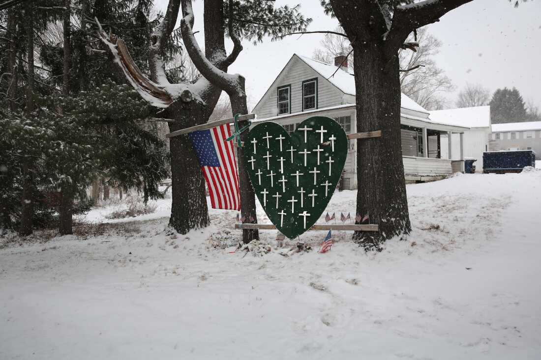 A memorial to massacre victims stands near the former site of Sandy Hook Elementary on Dec. 14, 2013 in Newtown, Connecticut, one year after  Adam Lanza shot and killed 20 first graders and six adults at the school. 