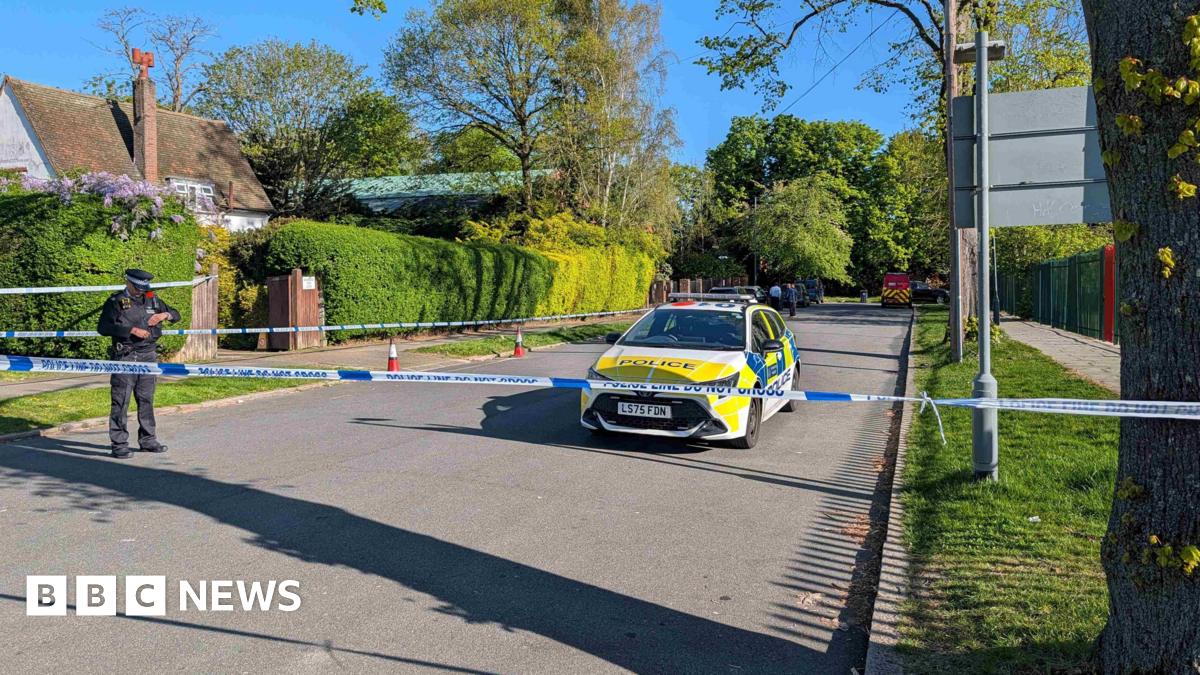 Police officers patrol at a cordon near to an incident at the Kenton United Synagogue in Harrow