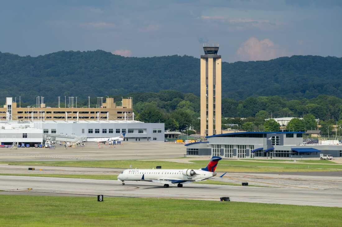 A Delta Air Lines regional jet lands at the Birmingham-Shuttlesworth International Airport in Birmingham, Ala., in June 2025. The Trump administration is asking Congress for more money to improve the nation's air traffic control system.
