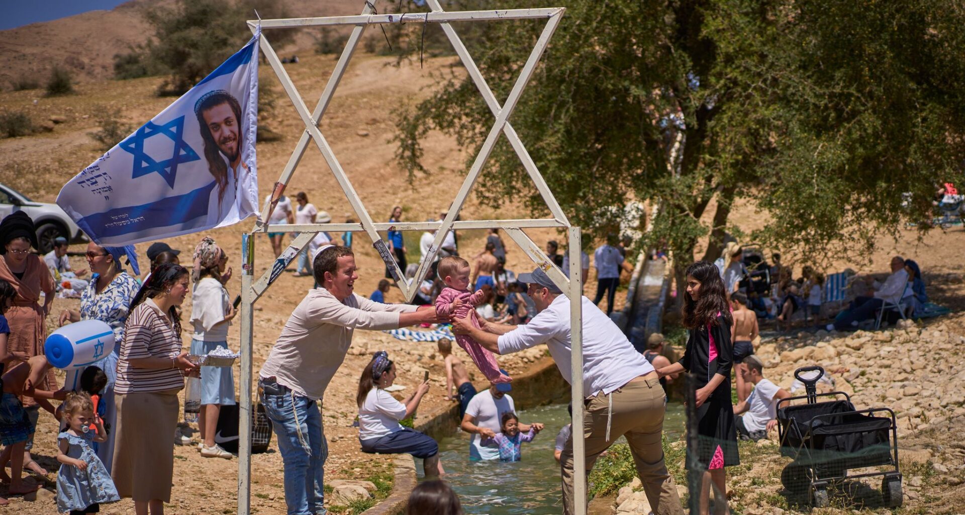 Photos show Israelis celebrating at a West Bank spring despite heightened tensions