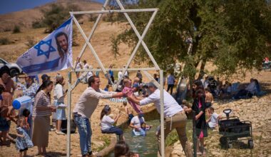 Photos show Israelis celebrating at a West Bank spring despite heightened tensions
