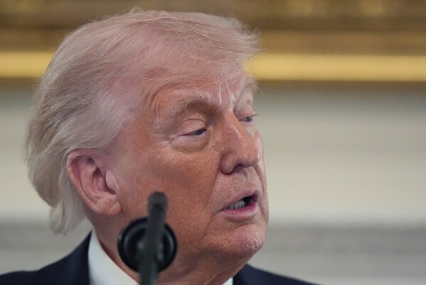 President Donald Trump speaks during an event for NCAA national champions in the State Dining Room of the White House, Tuesday, April 21, 2026, in Washington. (AP Photo/Alex Brandon)