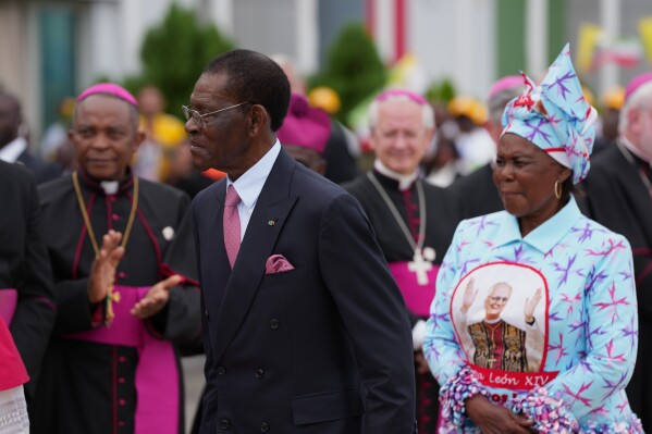 Equatorial Guinea's President Teodoro Obiang Nguema Mbasogo, front, attends a welcome ceremony for Pope Leo XIV at Malabo International Airport in Malabo, Equatorial Guinea, Tuesday, April 21, 2026, on the ninth day of Pope Leo's 11-day pastoral visit to Africa. (AP Photo/Misper Apawu)