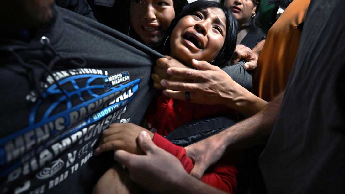 Title: ICE Arrests at New York Court Credit: © Carol Guzy, ZUMA Press, iWitness, for Miami Herald Caption: Distraught girls cling to their father, Luis, as ICE detains him following an immigration hearing. Luis served as the sole breadwinner for his family. New York City, New York, United States, 26 August 2025. Story: In 2025, shifts in US immigration policy transformed courthouses into focal points for mass deportation efforts by US Immigration and Customs Enforcement (ICE). Masked ICE agents detained undocumented migrants immediately following their hearings, often leading to deeply traumatic family separations. These aggressive tactics, coupled with severely overcrowded and unsanitary conditions at the 10th-floor holding facility in the Jacob K. Javits Federal Building in New York, prompted fierce public protests, class-action lawsuits, and the arrest of local elected officials demanding accountability.