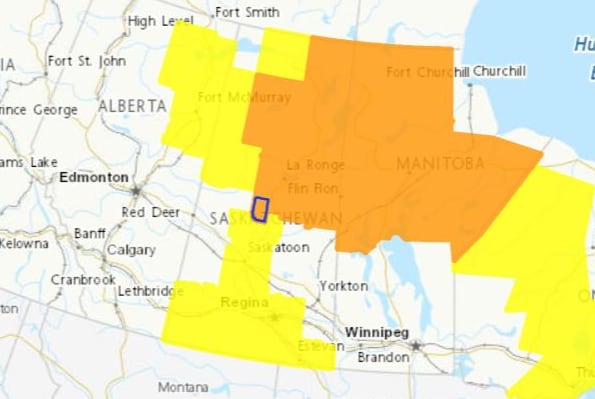 A map showing Saskatchewan covered in orange and yellow colours indicating where the weather warnings are