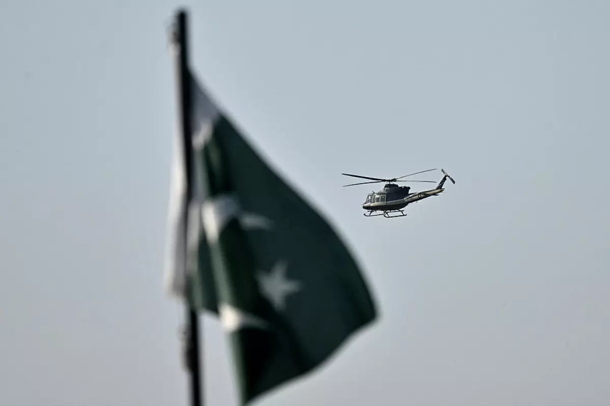 A helicopter flies over the Red Zone area of Islamabad on Saturday.