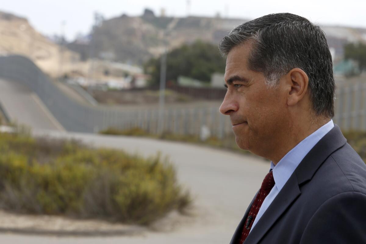 Atty. Gen. Xavier Becerra holds a news conference in Border Field State Park in San Diego in 2017.
