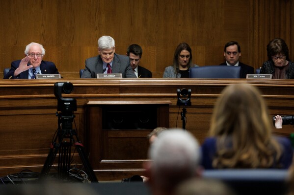 Ranking member Sen. Bernie Sanders I-Vt. questions Dr. Casey Means during a Senate Health, Education Labor and Pension Committee confirmation hearing for U.S. Surgeon General on Capitol Hill Wednesday, Feb. 25, 2026, in Washington. (AP Photo/Tom Brenner)