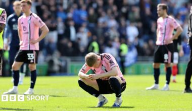 Leicester player Jordan James is hunched down in disappointment after the Foxes are beaten at Portsmouth.