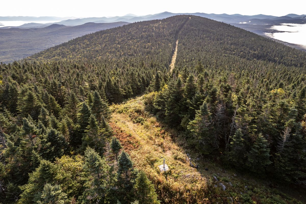 The international border path which separates Maine, USA from Quebec, Canada