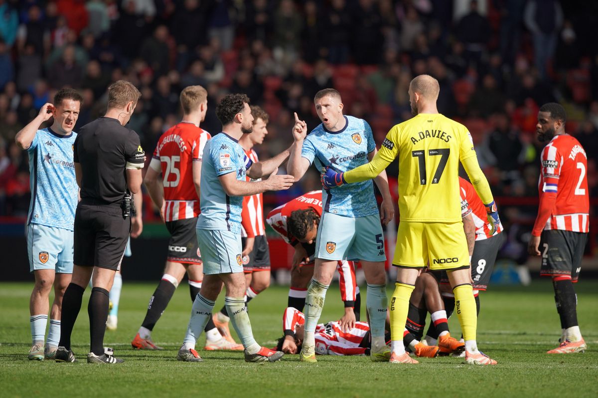 Hull City's John Lundstram was shown a red card by John Brooks