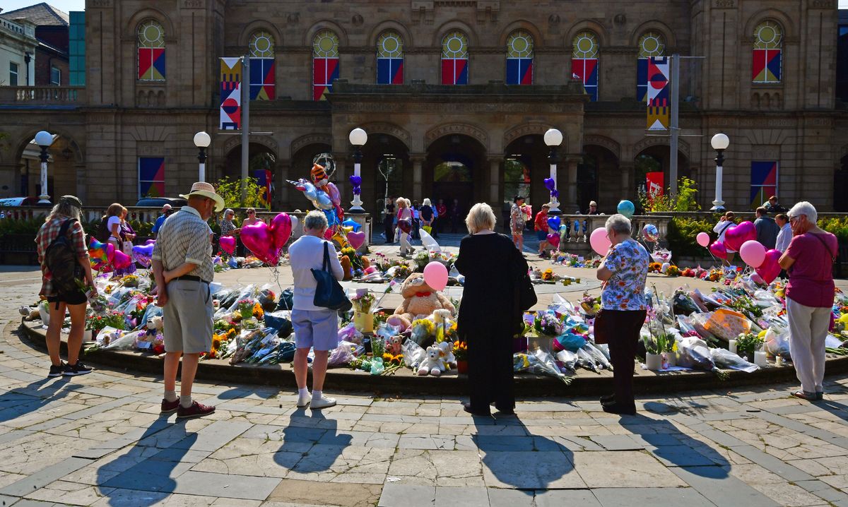 Tributes laid in Southport town centre 