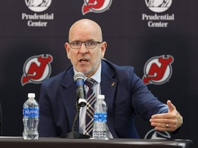 New Jersey Devils general manager Tom Fitzgerald talks about the hiring of new NHL hockey team head coach Sheldon Keefe, left, during press conference Tuesday, May 28, 2024, in Newark, N.J.
