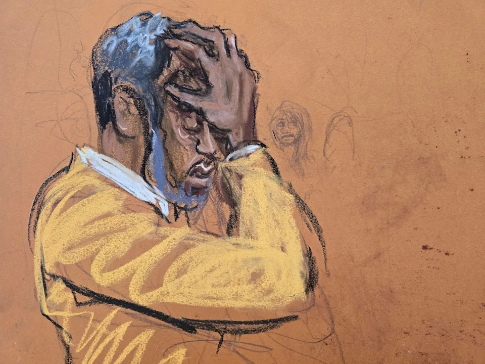 A courtroom sketch of Sean "Diddy" Combs with his hand raised to his head. 