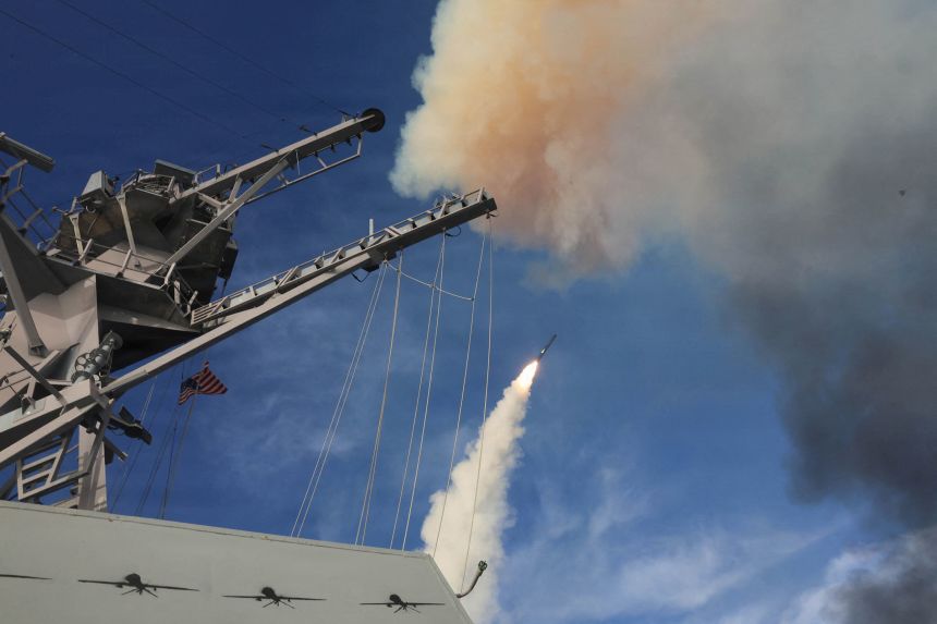The USS Thomas Hudner fires a Tomahawk land attack missile, in support of the war in Iran, from an undisclosed location on March 21, 2026.