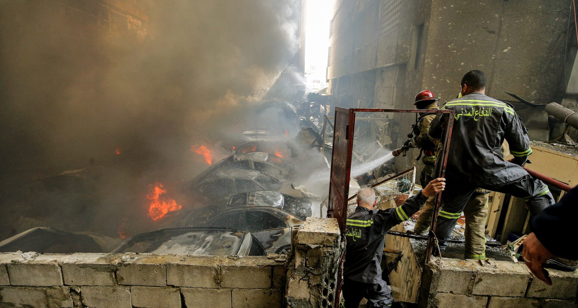 Firefighters try to douse a fire at the site hit by an Israeli airstrike in Beirut on April 8, 2026.