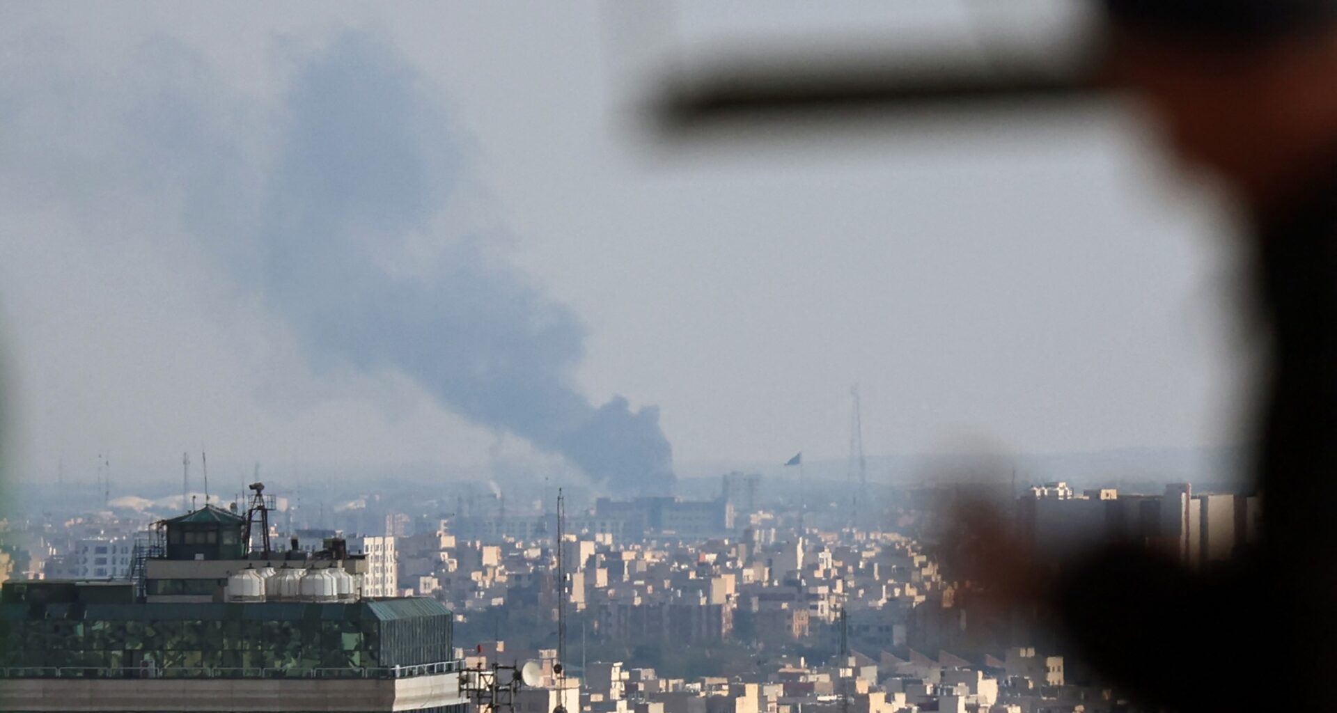 Smoke rises from the site of a strike in Tehran on April 1, 2026. An AFP journalist reported several huge explosions in the west of the Iranian capital Tehran on April 1 afternoon. Israel said earlier on April 1 it had struck several targets in Tehran.