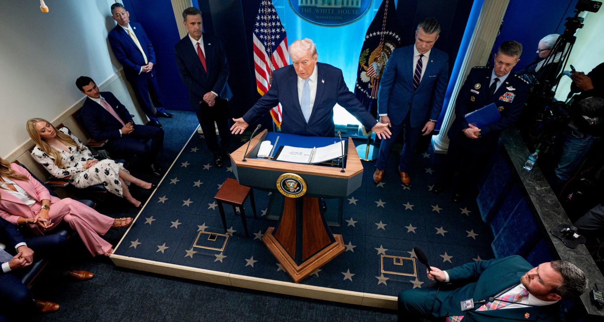 U.S. President Donald Trump, accompanied by CIA Director John Ratcliffe (C-L), Secretary of War Pete Hegseth (2nd-R) and Chairman of the Joint Chiefs of Staff General Dan Caine (R), speaks during a news conference in James S. Brady Press Briefing Room of the White House on April 06, 2026 in Washington, D.C.