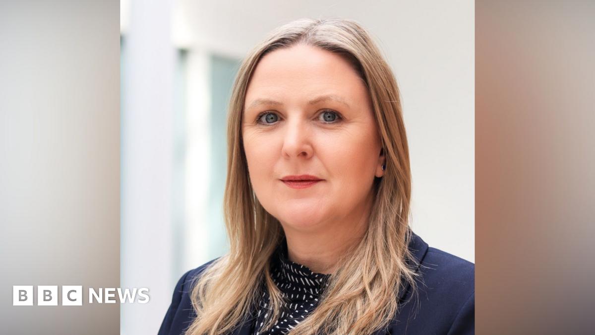 Sam Dennis is pictured. She is a white woman with long blond hair.