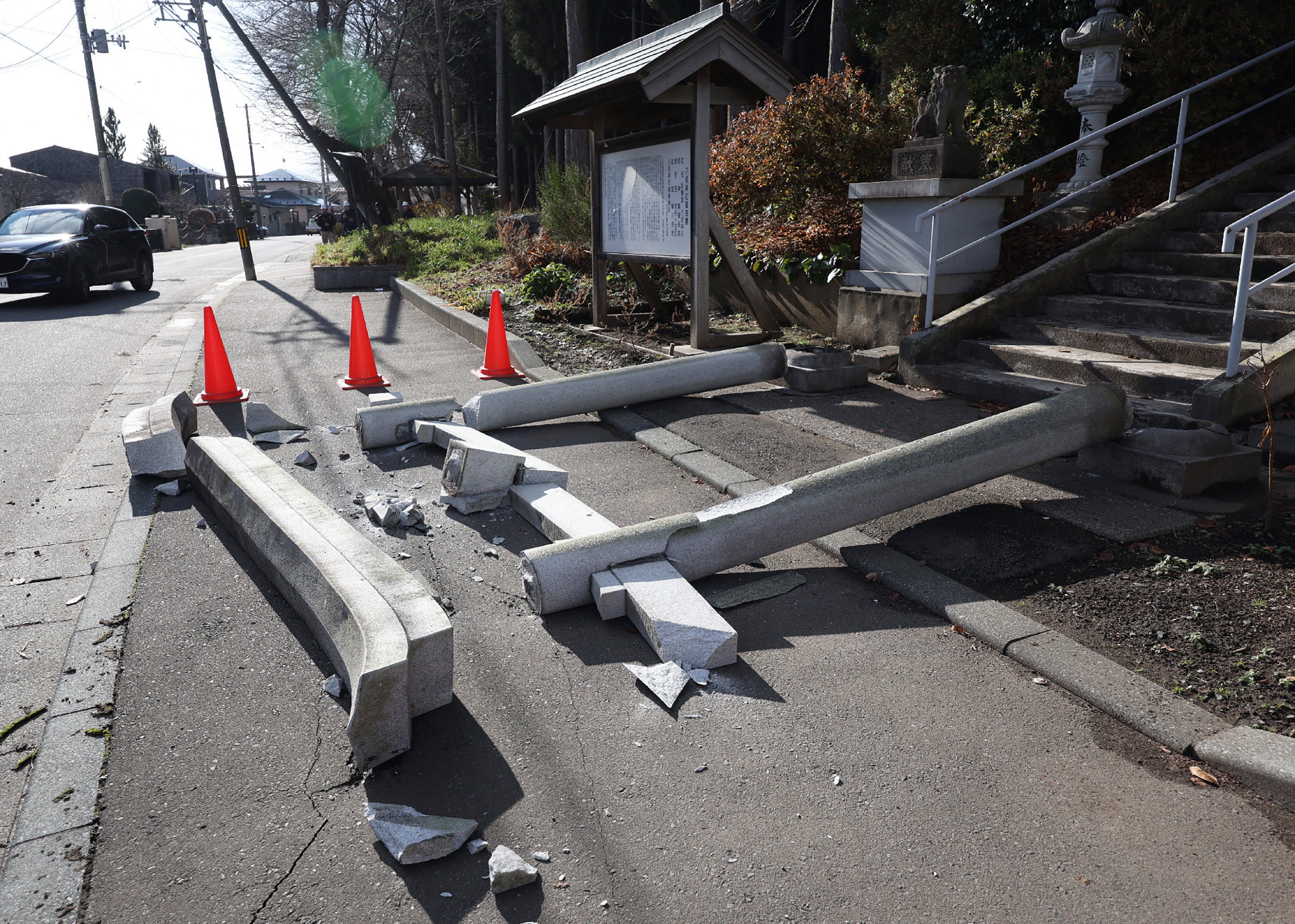 File: A torii gate at the entrance of Yasaka Shrine is seen after it collapsed onto a sidewalk in Hachinohe City in Aomori prefecture