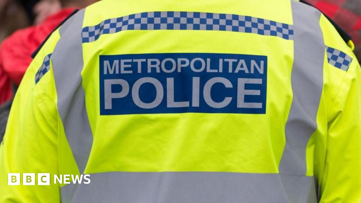 a close up stock image of the back of a uniformed Metropolitan Police officer