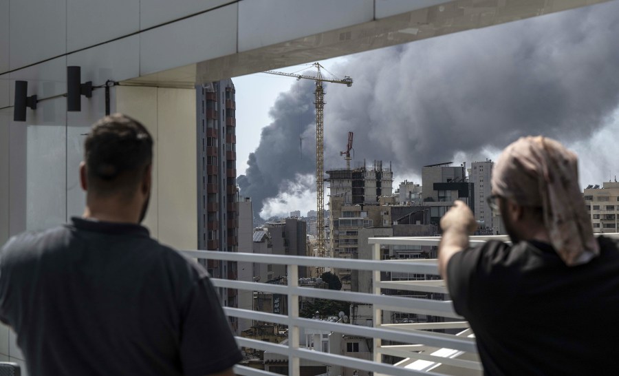 Smoke rises an Israeli airstrike on the Dahyieh district in the south of Beirut.