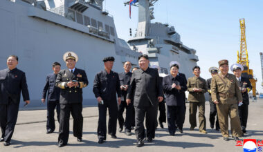 North Korea's Kim Jong Un supervises missile tests from his naval destroyer