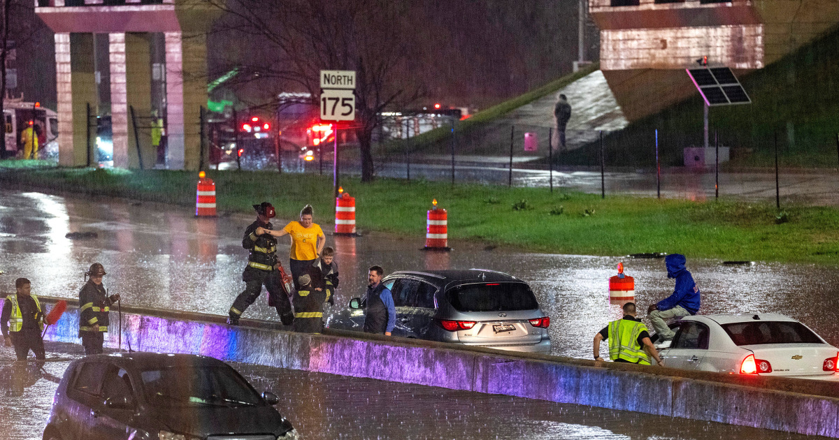 Floodwaters inundate Wisconsin streets, trapping drivers, as Midwest rebuilds after powerful storms