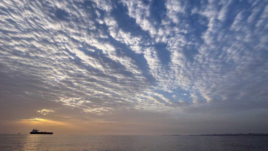 Iran closes Strait of Hormuz over US blockade, fires on ships