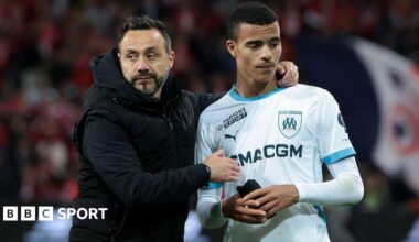 Roberto de Zerbi talks to Mason Greenwood following a Ligue 1 football match between Lille and Marseille