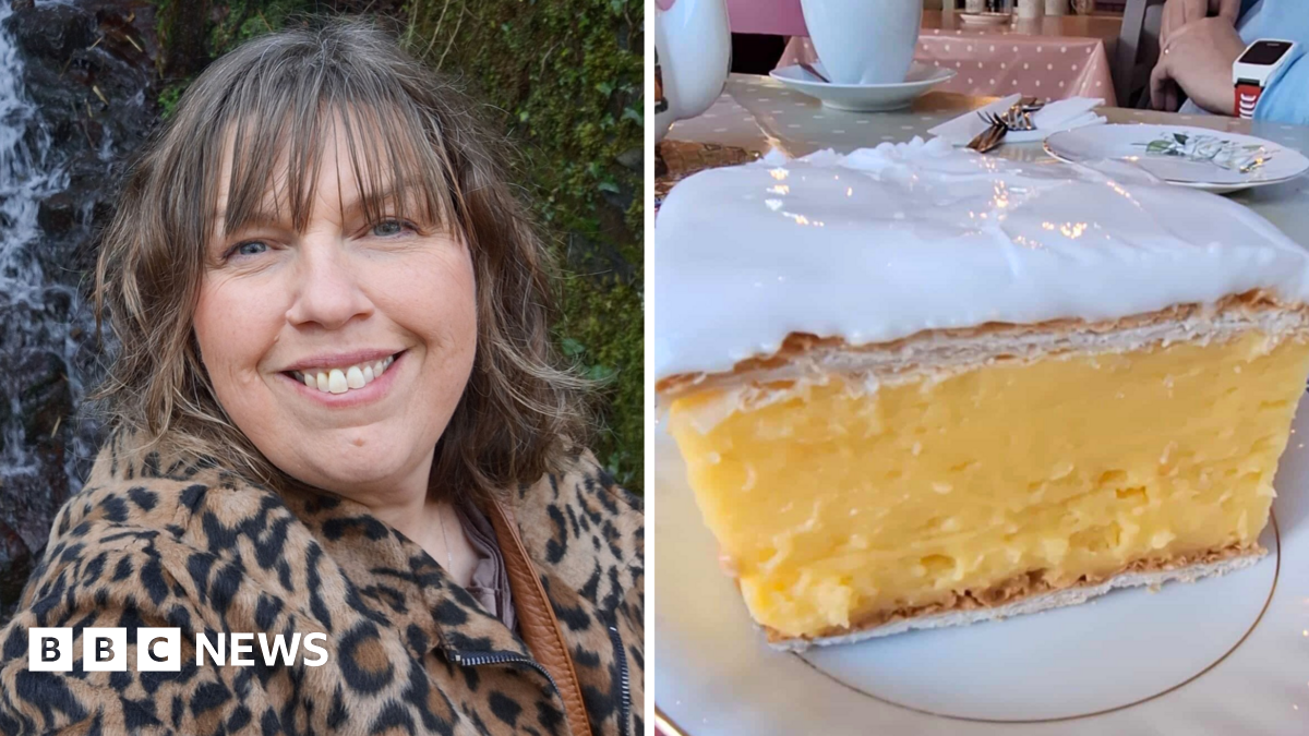 Two photos side by side. On the left is Dawn Fearn, a woman in her 50s. She has shoulder length brown hair and a fringe and smiles at the camera. She is wearing a leopard print coat. On the right is a large custard slice pastry on a plate.