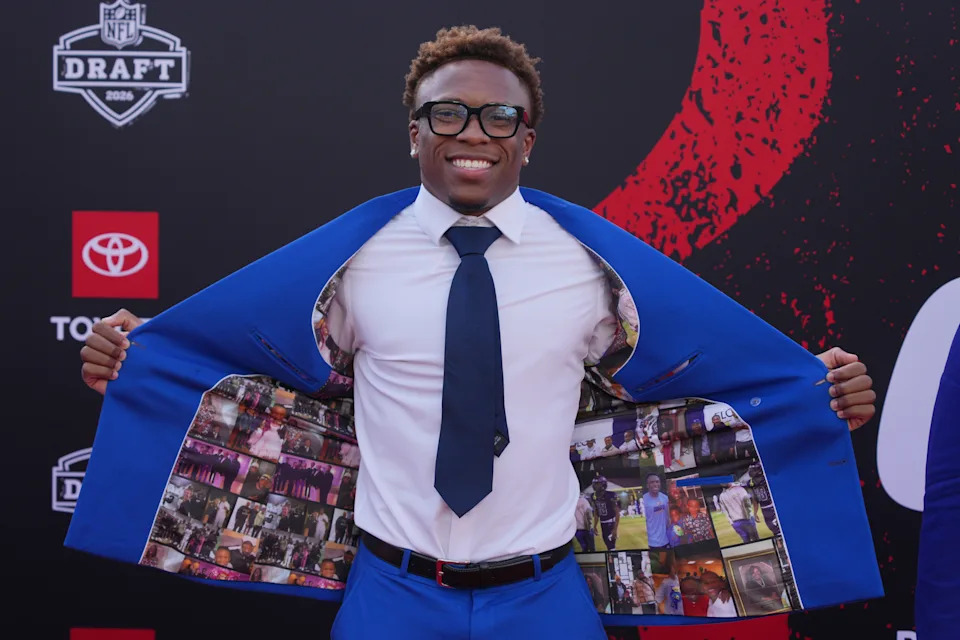 Tennessee defensive back Colton Hood poses on the red carpet before the first round of the NFL football draft in Pittsburgh.