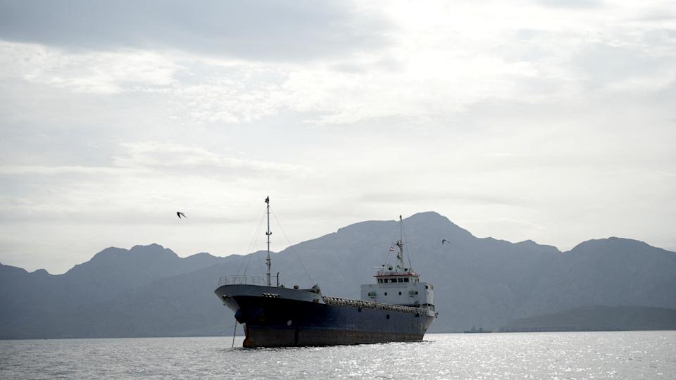 FILE PHOTO: A vessel in the Strait of Hormuz, off the coast of Oman’s Musandam province, April 12, 2026. REUTERS/File Photo