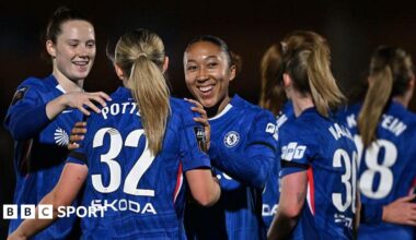 Chelsea women's players celebrate a goal