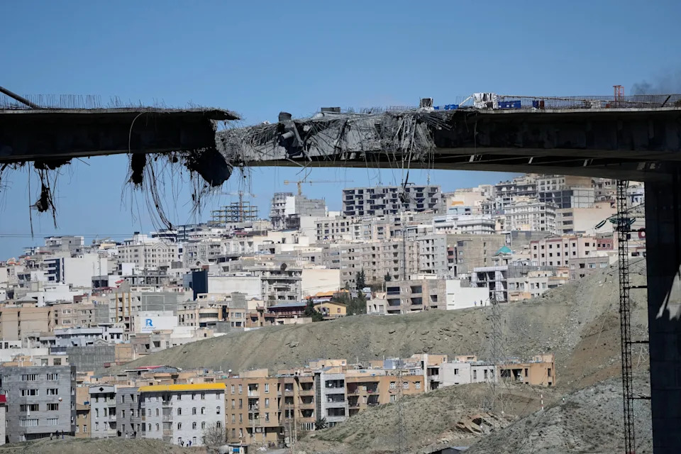 A bridge struck by U.S. airstrikes on Thursday is seen in the town of Karaj, west of Tehran, Iran, Friday, April 3, 2026. (AP Photo/Vahid Salemi)