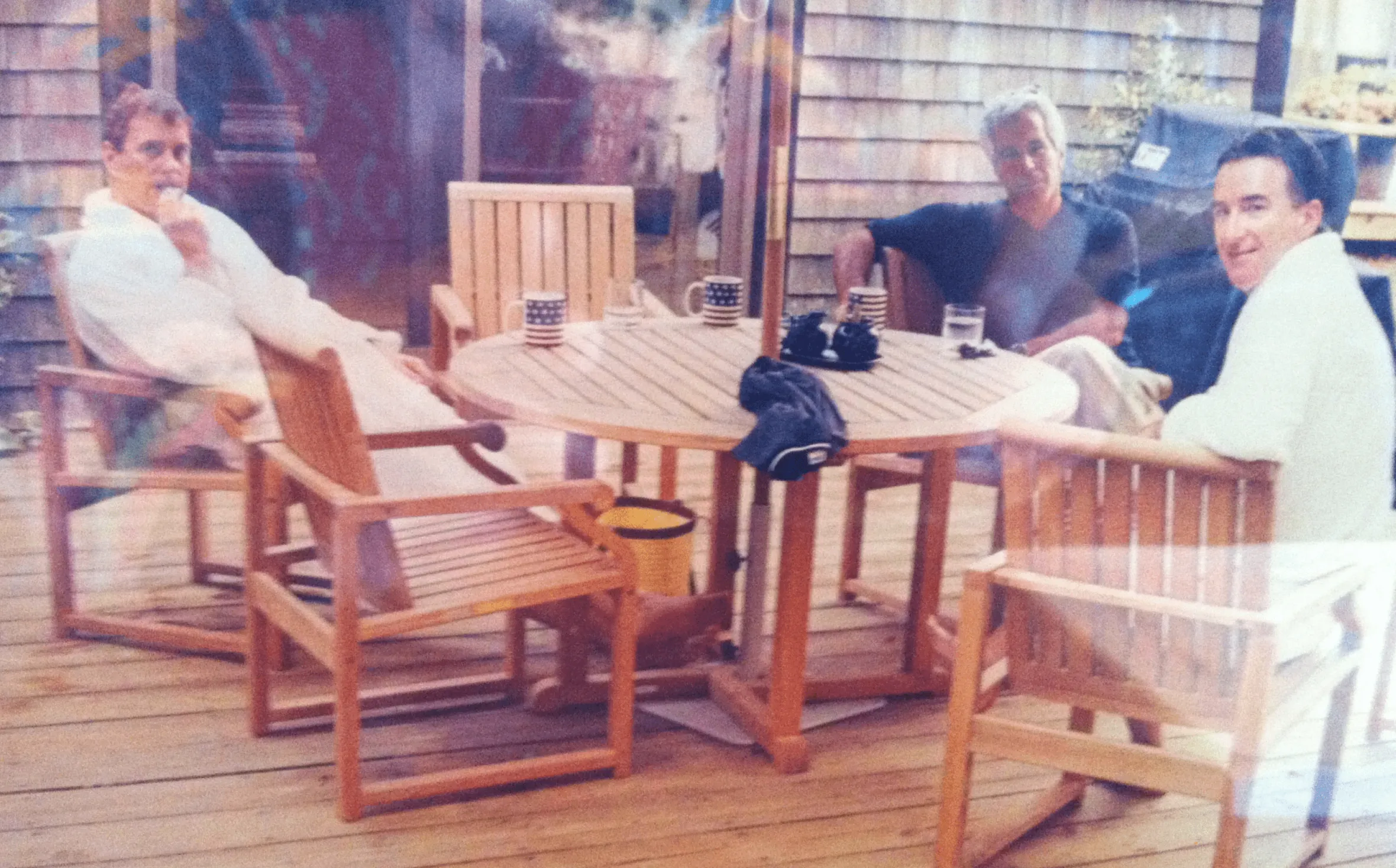 Andrew Mountbatten-Windsor and Lord Peter Mandelson in bathrobes alongside Jeffrey Epstein.