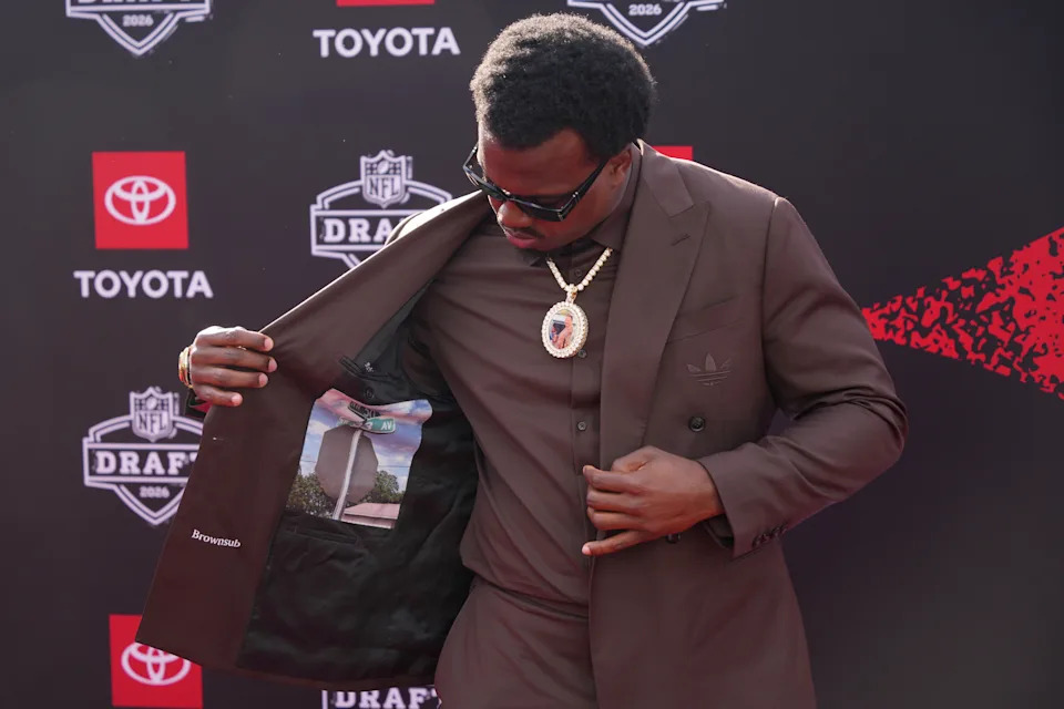 Miami defensive lineman Rueben Bain Jr. poses on the red carpet before the first round of the NFL football draft in Pittsburgh. 