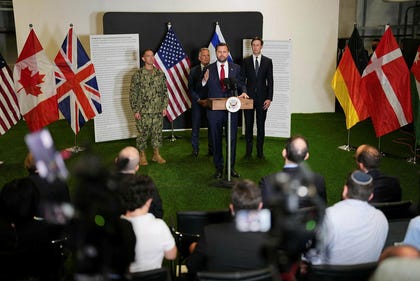 U.S. Vice President JD Vance standing alongside U.S. envoys Jared Kushner and Steve Witkoff, at the CMCC in Kiryat Gat, November.