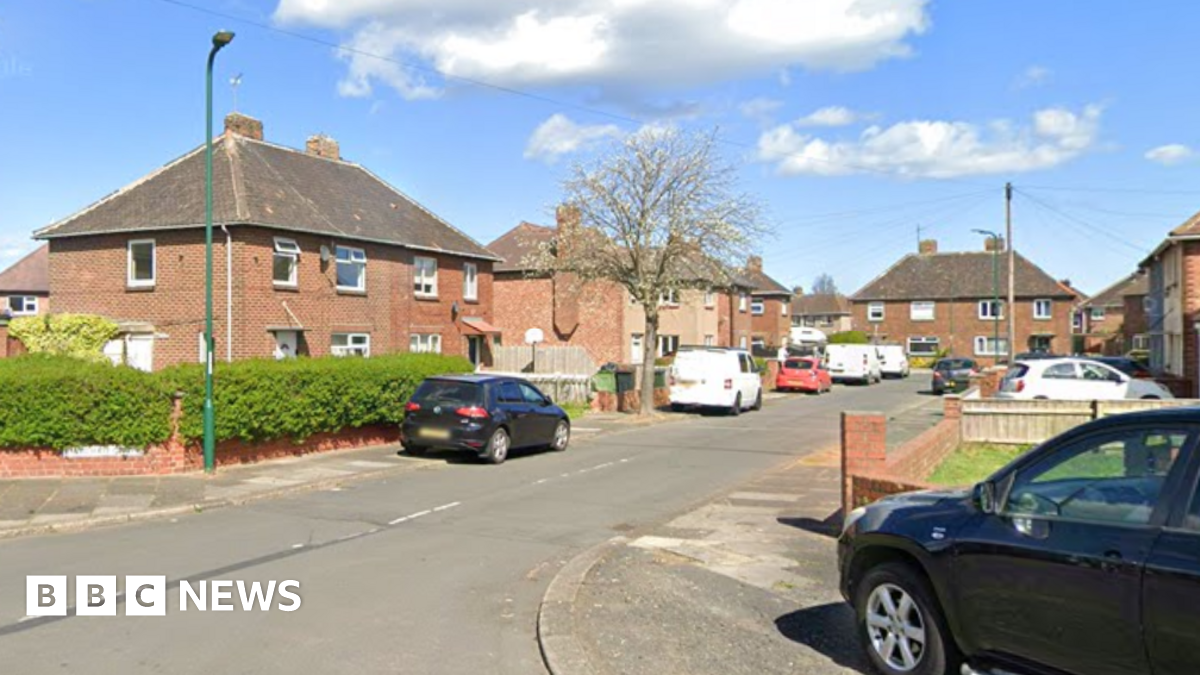 A Google street view of Hardale Grove. It is a residential cul-de-sac with cars parked on the pavement.
