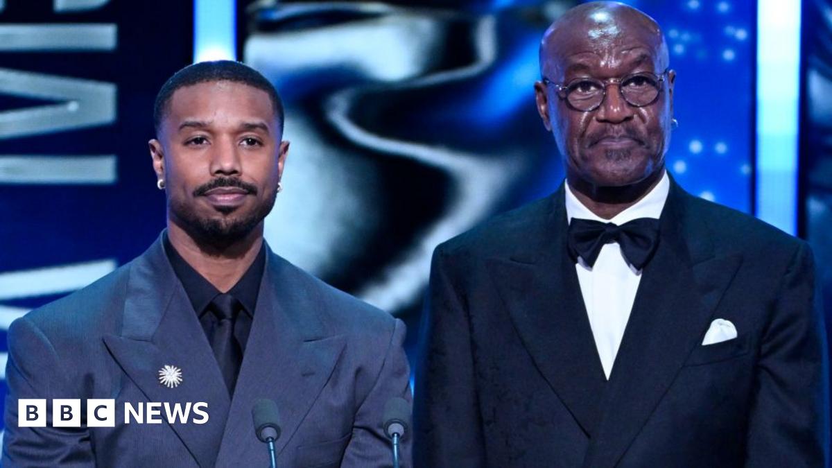Michael B. Jordan and Delroy Lindo present the Special Visual Effects Award on stage during the EE BAFTA Film Awards 2026 at The Royal Festival Hall on February 22, 2026 in London, England