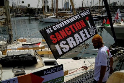 A banner with a message calling for the New Zealand government to sanction Israel on a boat of a Gaza humanitarian flotilla, in Barcelona, Spain, Saturday.