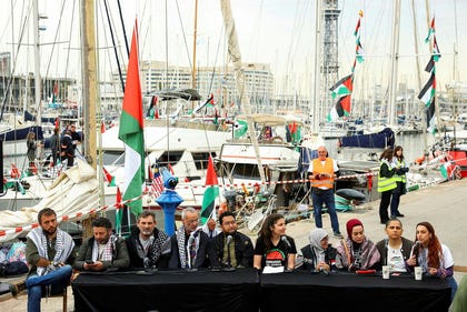 Global Sumud Flotilla Steering Committee members attend a press conference as humanitarian flotilla prepares to depart for Gaza, from Barcelona, Spain, Sunday.