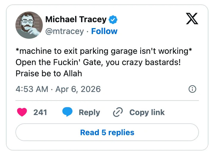 Social media post by Michael Tracey, frustrated about a malfunctioning parking garage machine, ending with an exclamation