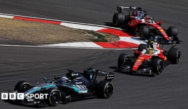 Mercedes' George Russell comes out of a hairpin ahead of Ferrari's Lewis Hamilton with Charles Leclerc immediately behind during the Chinese Grand Prix sprint race