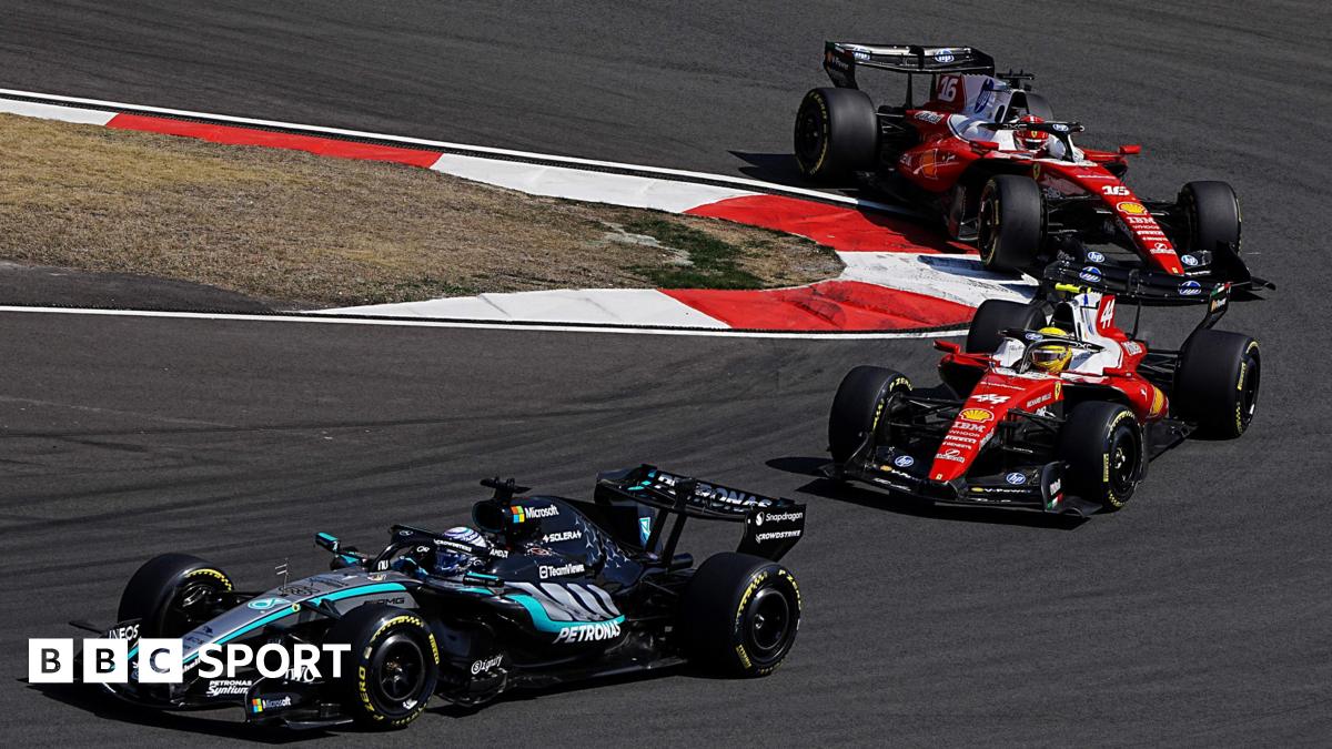 Mercedes' George Russell comes out of a hairpin ahead of Ferrari's Lewis Hamilton with Charles Leclerc immediately behind during the Chinese Grand Prix sprint race