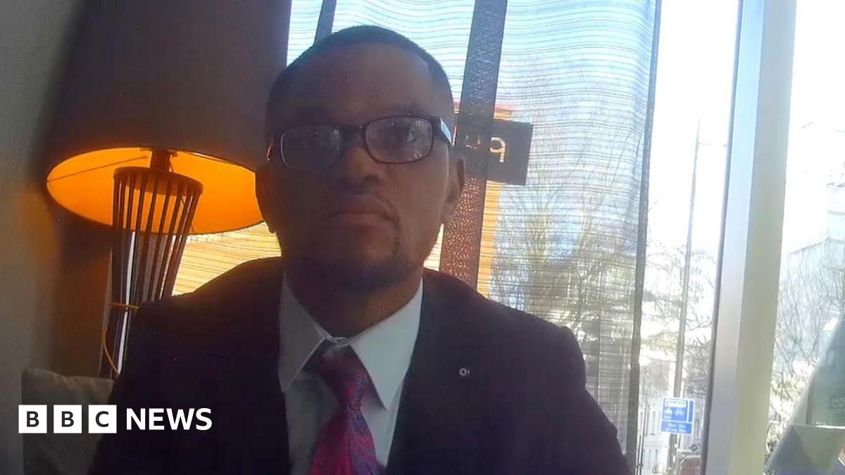 Jess Phillips MP. pictured against black background, looks off to the side