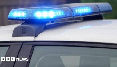 Blue lights on top of police car