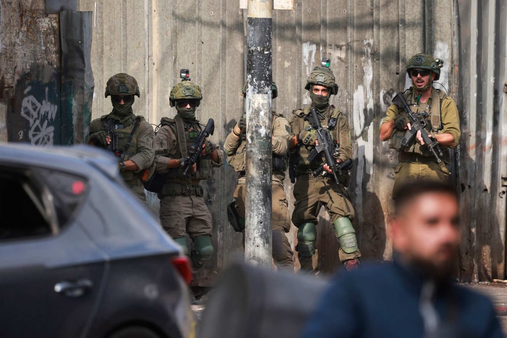 Israeli troops deploy during a raid in the occupied West Bank city of Nablus in August last year. Photo: AFP