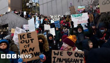 ICE agent charged for pulling gun on motorists, Minnesota prosecutor says - BBC